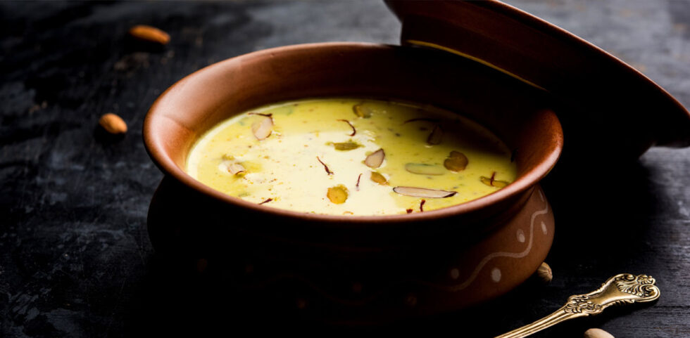 Creamy Basundi dessert garnished with nuts - traditional Maharashtrian sweet